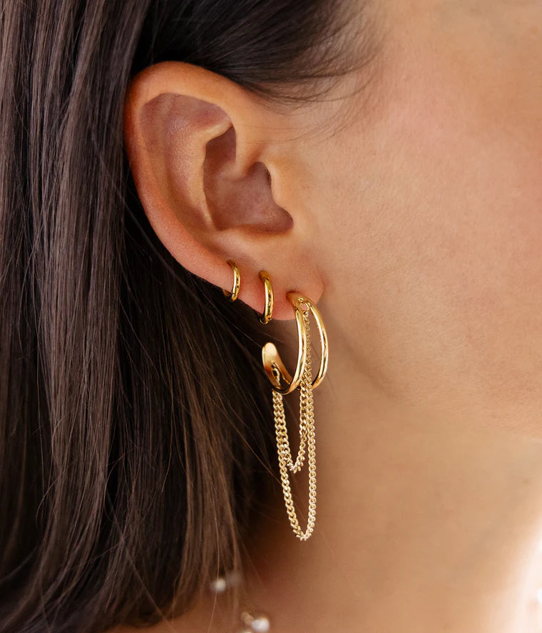 Boucles d’oreilles Nereal ZAG en acier inoxydable doré avec chaînes pendantes