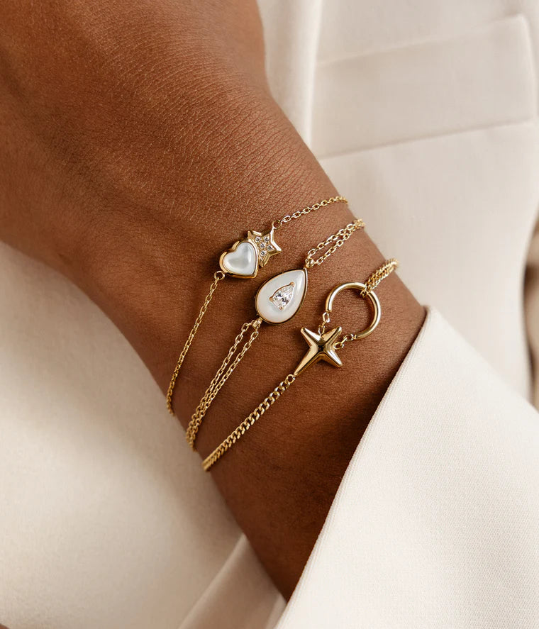 Bracelet Boson ZAG en acier inoxydable doré avec goutte en nacre blanche et zircon