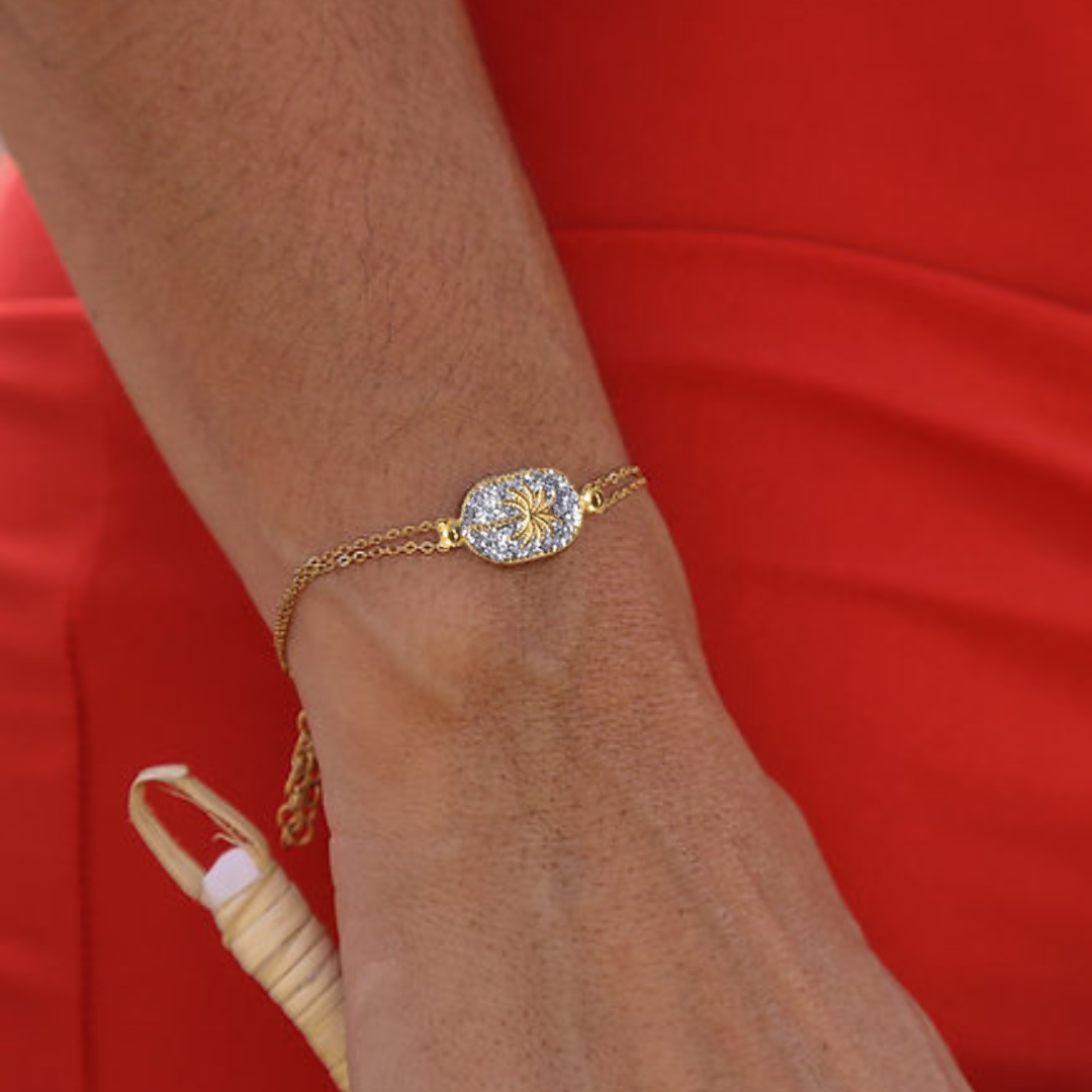 Bracelet Santa Giulia Palmier Argent Amadrina en acier inoxydable doré à l'or fin 18K avec palmier doré, pavage de paillettes argentées et perle de corail naturelle