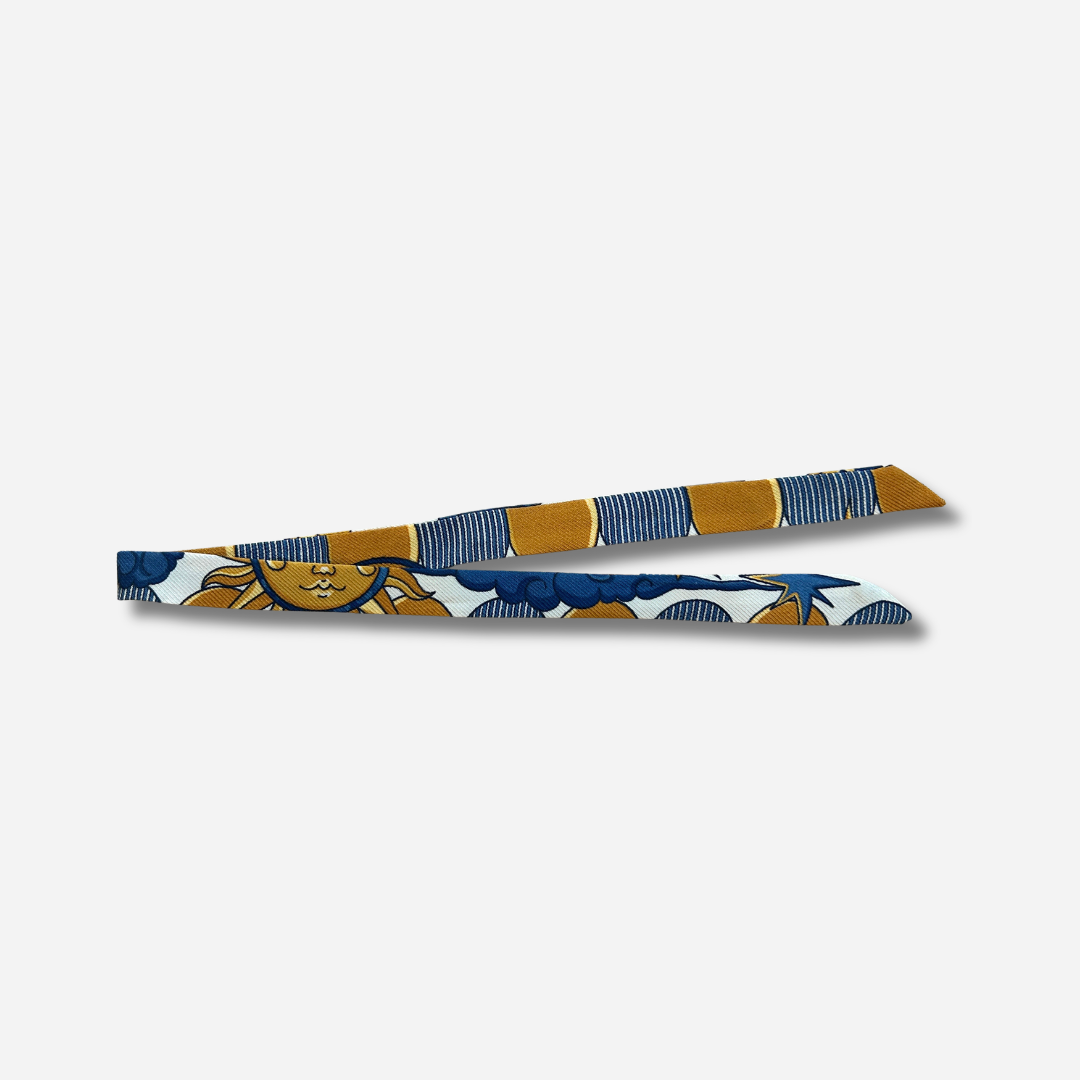 Ruban en soie 1 cm Cirque des Rêves Neutre An-née bleu ocre motif soleil étoiles