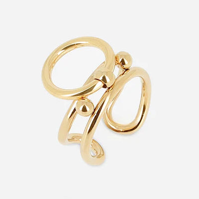 Bague Aglae Zag dorée avec anneaux entrelacés en acier
