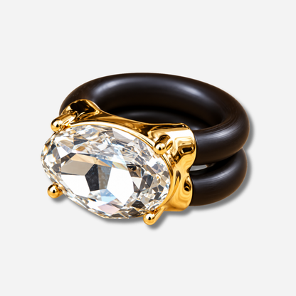 Bague Diva Blanc avec grand cristal ovale facetté transparent, monture dorée et double anneau marron
