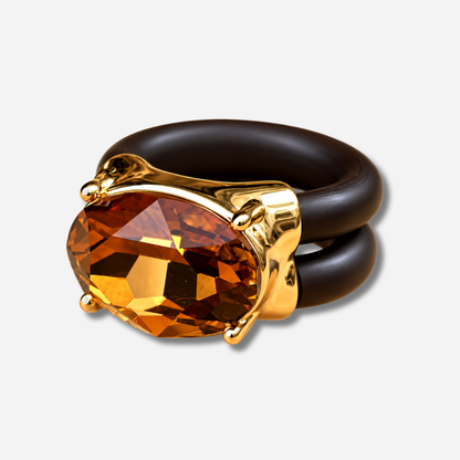 Bague Diva marron avec grand cristal ovale facetté et monture dorée