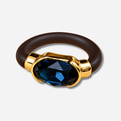 Bague Gala bleu nuit avec cristal ovale facetté et monture dorée