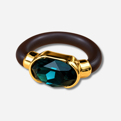 Bague Gala bleu pétrole avec cristal ovale facetté et monture dorée