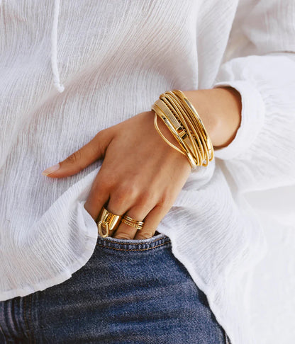 Bague Gin Zag portée accumulation bagues dorées Zag