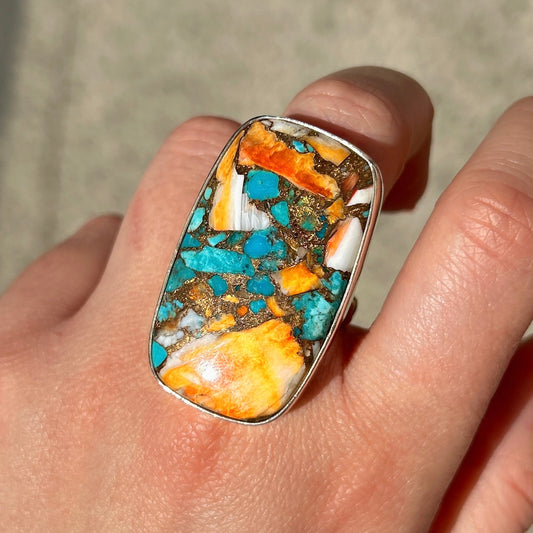 Bague turquoise cuivre orange rectangle portée argent 925