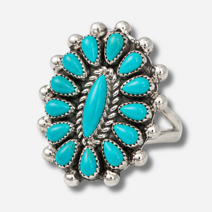 Bague Harpo P01 pièce unique en argent 925 ornée de turquoises véritables serties à la main dans une composition florale inspirée des bijoux Navajo traditionnels.