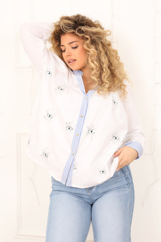 Blouse blanche femme brodée motif œil manches longues Blouse Vaya Divinity