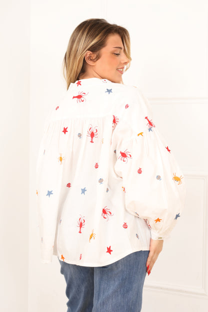 Blouse blanche femme manches longues vue de dos