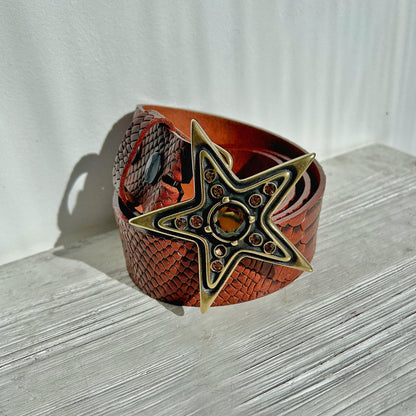 Boucle Yolète étoile dorée détail strass topaze