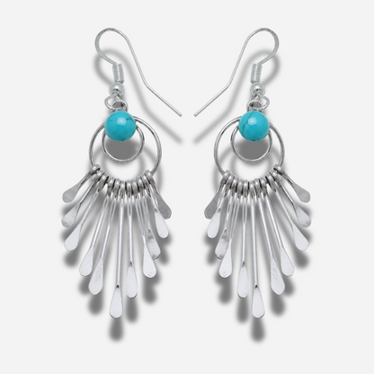 Boucles d’oreilles Harpo BOW24 en argent avec pampilles mobiles et perles turquoise inspirées du style western et bohème.