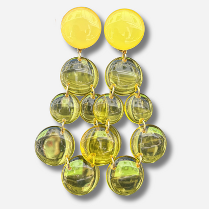 Boucles d'oreilles Cristallines Jaune Francine Bramli Paris en résine translucide jaune avec design graphique en cascade.