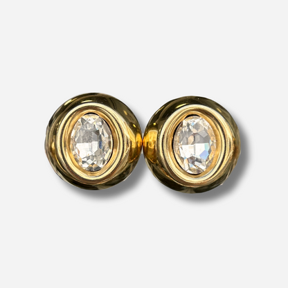 Boucles Rainball Diamond Gold Francine Bramli Paris en résine dorée avec cristal facetté central lumineux.