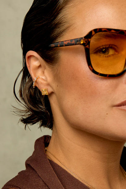 Boucles Lotus Mya Bay dorées fleur zircon