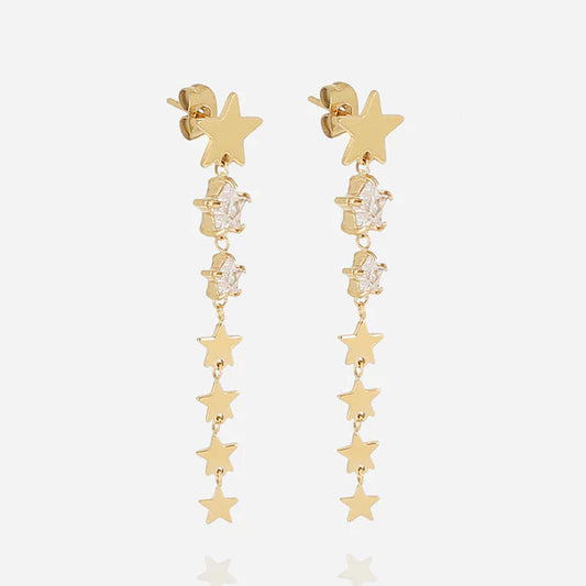 Boucles d’oreilles Akiva ZAG en acier inoxydable doré avec étoiles suspendues et zircons