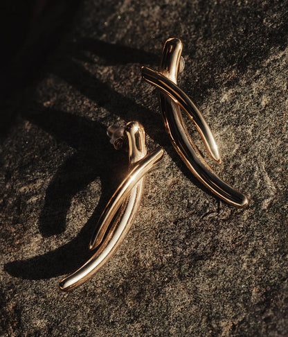 Boucles d’oreilles Apion ZAG en acier inoxydable doré au design croisé et graphique