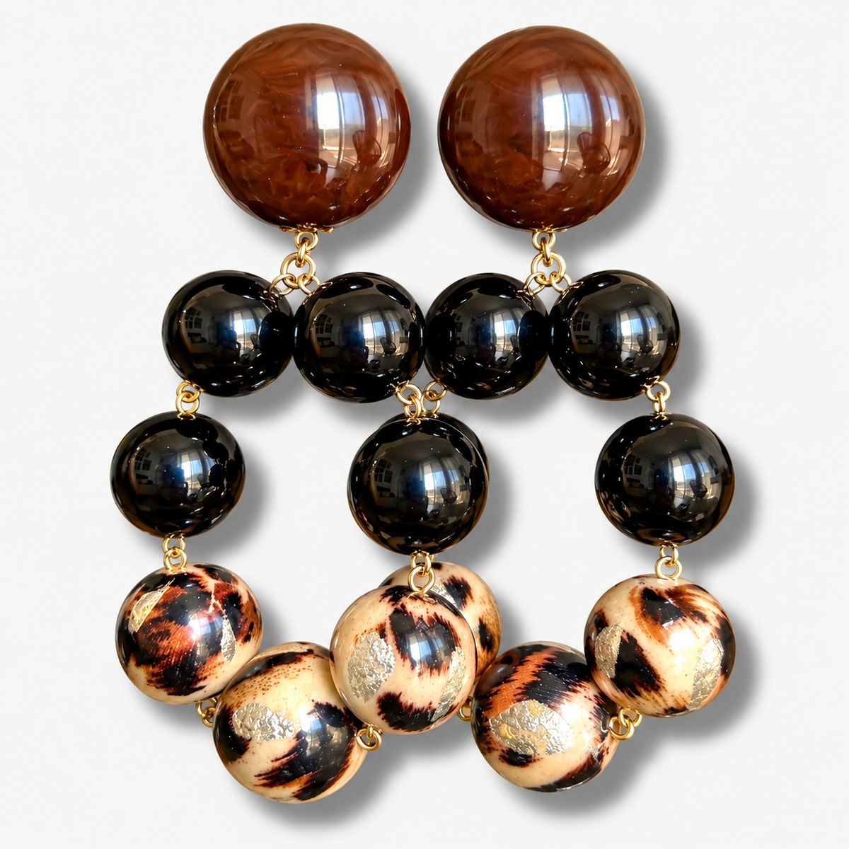 Boucles d’oreilles Bastille Safari léopard noir et brun Francine Bramli Paris
