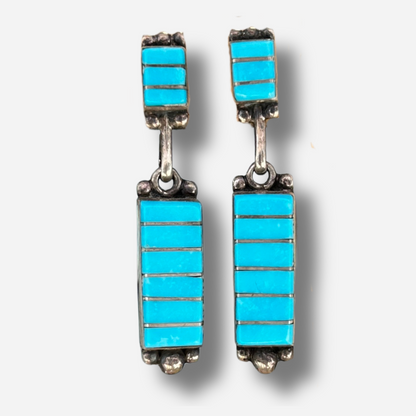 Boucles d’oreilles Harpo E01 en argent avec incrustation de turquoise naturelle, pièce unique inspirée des bijoux Navajo.