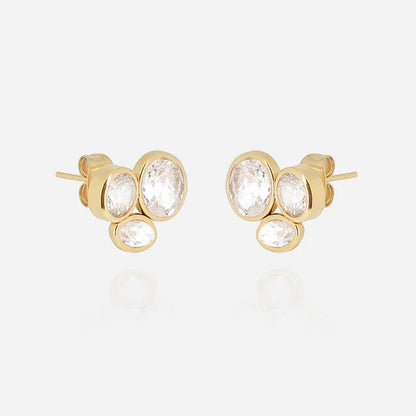 Boucles d’oreilles Galane ZAG en acier inoxydable doré avec trois zirconiums