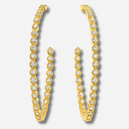 Grandes boucles d’oreilles Great Infinity MYA BAY dorées, ornées d’une succession de cristaux blancs ronds et marquises, disponibles chez Divinity Sète.