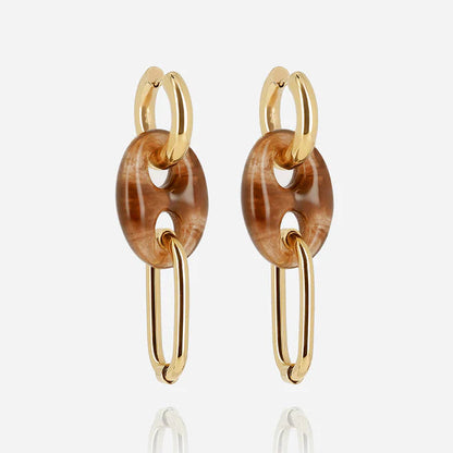 Boucles d’oreilles Ivy ZAG en acier inoxydable doré et résine marbrée