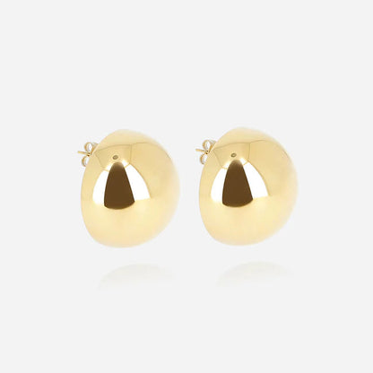 Boucles d’oreilles Kleeva ZAG en acier inoxydable doré avec forme ronde bombée