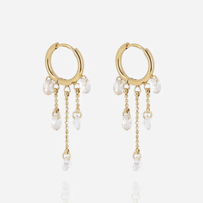 Boucles d’oreilles Molfetta ZAG en acier inoxydable doré avec pampilles en zirconiums blancs