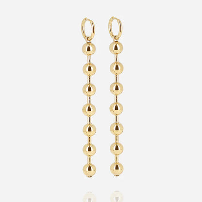 Boucles d’oreilles Numa ZAG en acier inoxydable doré avec perles pendantes