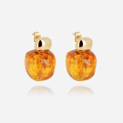 boucles-oreilles-oedipe-zag-resine-acier-dore-divinity-sete.jpg