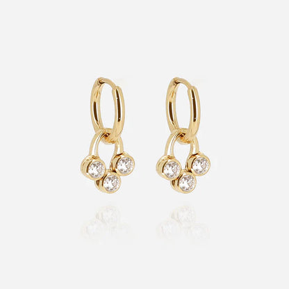 Boucles d’oreilles Rossi ZAG en acier inoxydable doré avec trio de zirconiums