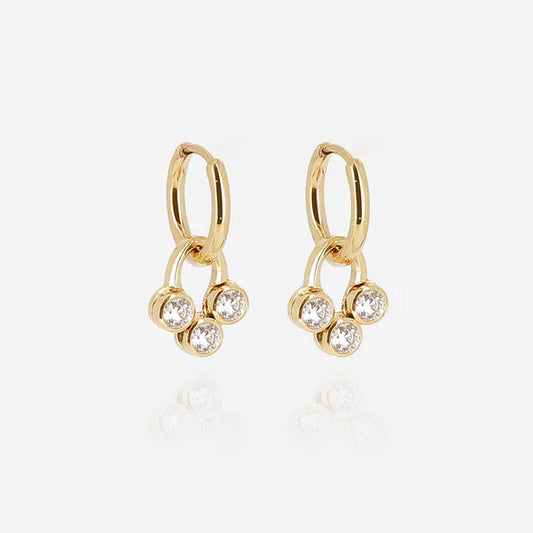 Boucles d’oreilles Rossi ZAG en acier inoxydable doré avec trio de zirconiums