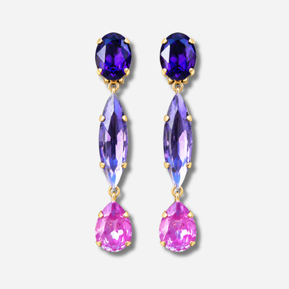 Boucles d’oreilles pendantes Talia Mûre Crézus à clips, trois cristaux facettés violet profond, lavande et rose sur montures dorées