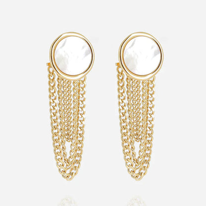 Boucles d’oreilles Wida ZAG en acier inoxydable doré avec médaillon en nacre blanche et chaînes pendantes