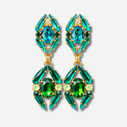 Boucles d’oreilles pendantes à clips Zénith Émeraude Crézus avec cristaux verts et turquoise, pierres ovales et navettes facettées, montures dorées – Divinity Sète