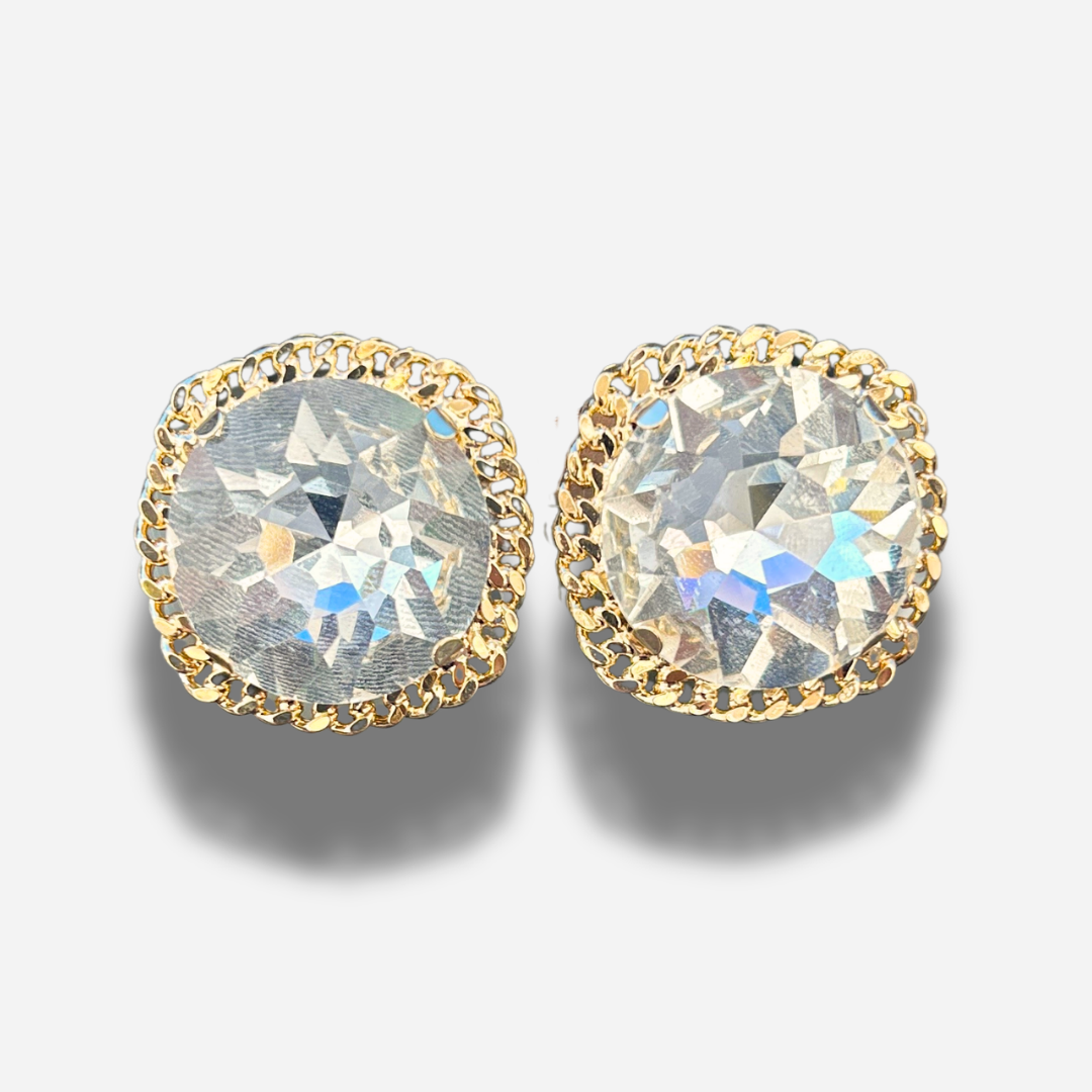 Boucles Rainball Adelaide Gold Francine Bramli Paris avec grand cristal transparent facetté et contour doré élégant.
