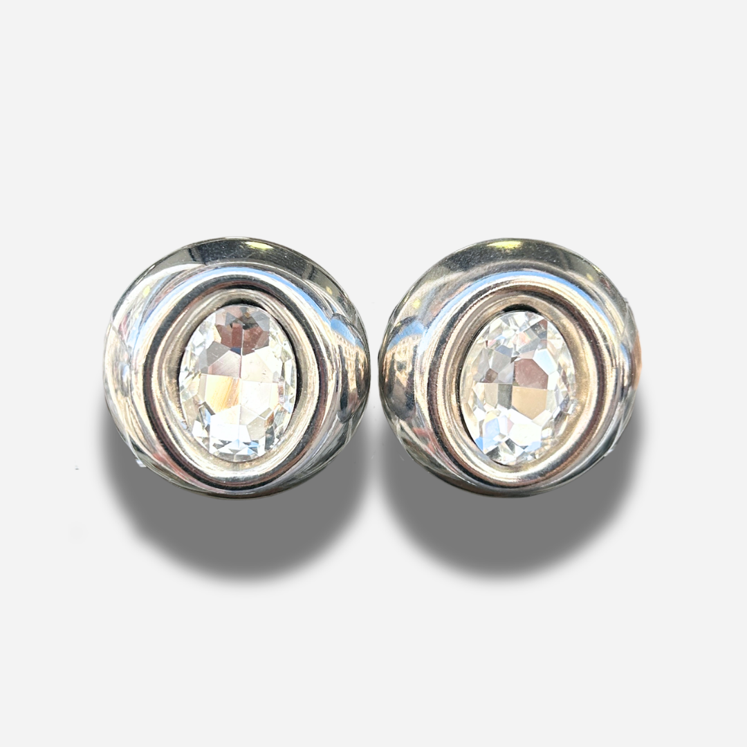 Boucles Rainball Diamond Silver Francine Bramli Paris avec cristal facetté transparent et monture argentée brillante.
