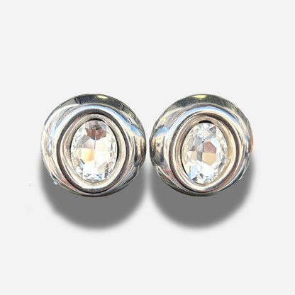 Boucles Rainball Diamond Silver Francine Bramli Paris avec cristal facetté transparent et monture argentée brillante.