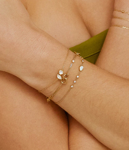 Bracelet Adrano ZAG en acier inoxydable doré avec goutte en nacre ou turquoise et zirconiums