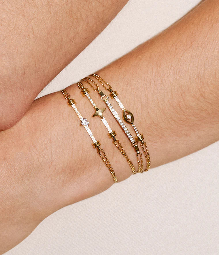 Bracelet Altiani ZAG en acier inoxydable doré avec motif œil protecteur et zircon central