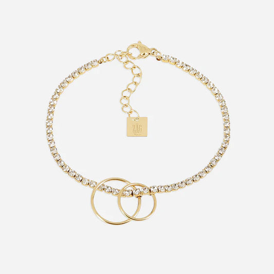 Bracelet Ananta ZAG en acier inoxydable doré avec zirconiums et trois anneaux entrelacés