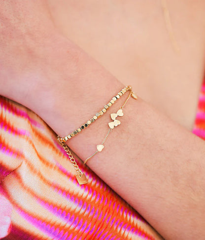 Bracelet Arisa ZAG en acier inoxydable doré avec petits cœurs