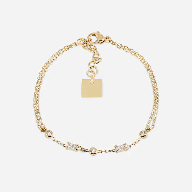 Bracelet Athis ZAG en acier inoxydable doré avec cristaux ronds et baguette