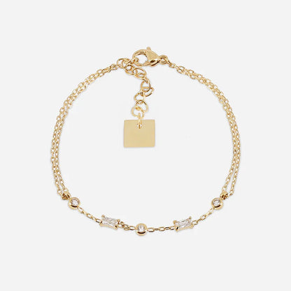 Bracelet Athis ZAG en acier inoxydable doré avec cristaux ronds et baguette