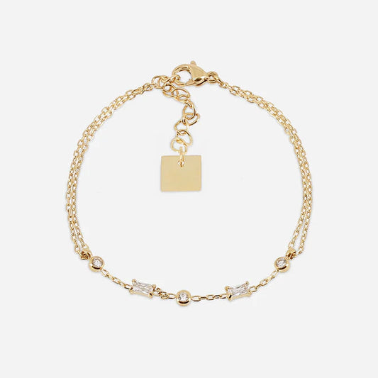 Bracelet Athis ZAG en acier inoxydable doré avec cristaux ronds et baguette