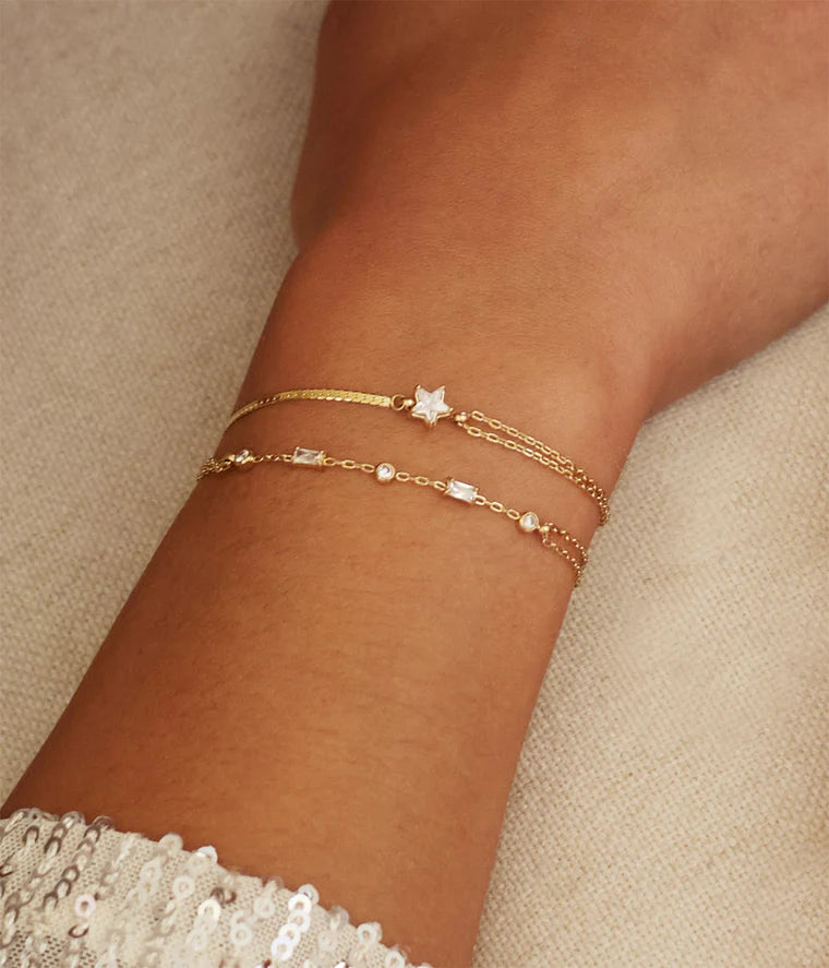 Bracelet Athis ZAG en acier inoxydable doré avec cristaux ronds et baguette