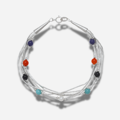 Bracelet B487 Harpo en argent massif liquid silver avec pierres naturelles multicolores fabriqué à la main selon la tradition Navajo.