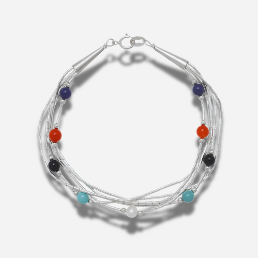 Bracelet B487 Harpo en argent massif liquid silver avec pierres naturelles multicolores fabriqué à la main selon la tradition Navajo.