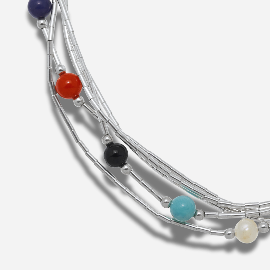 Bracelet B487 Harpo en argent massif liquid silver avec pierres naturelles multicolores fabriqué à la main selon la tradition Navajo.