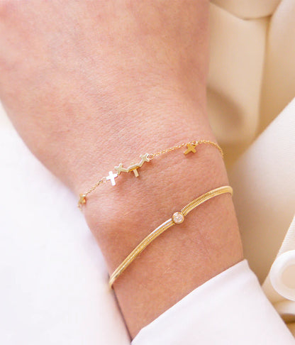 Bracelet Beata ZAG en acier inoxydable doré avec petites croix